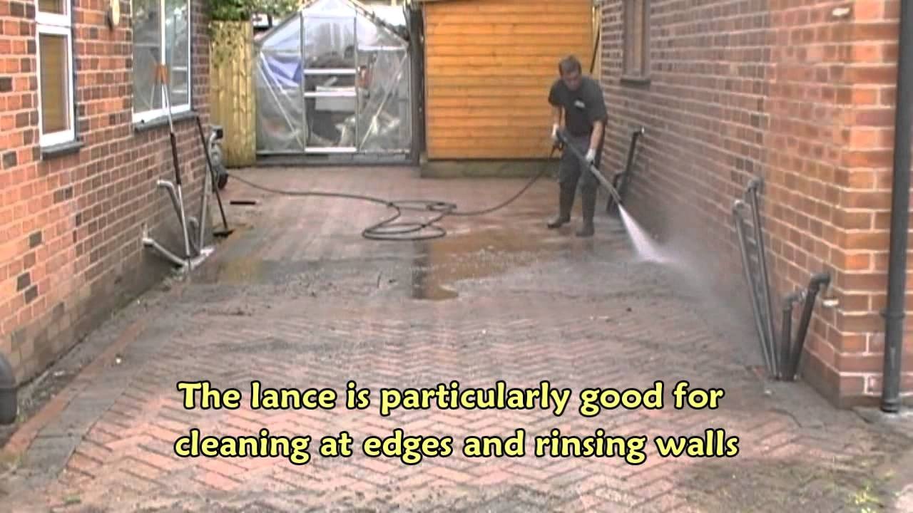 Driveway power washing in progress