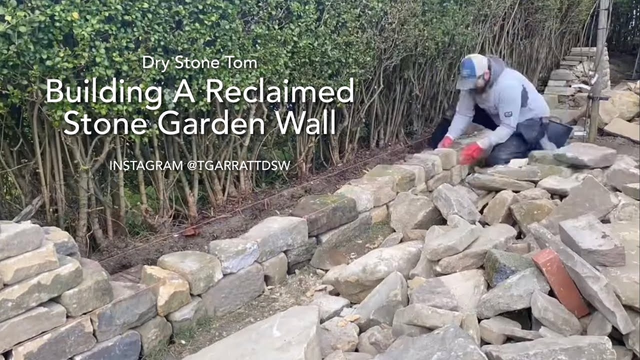 Stone wall construction in garden